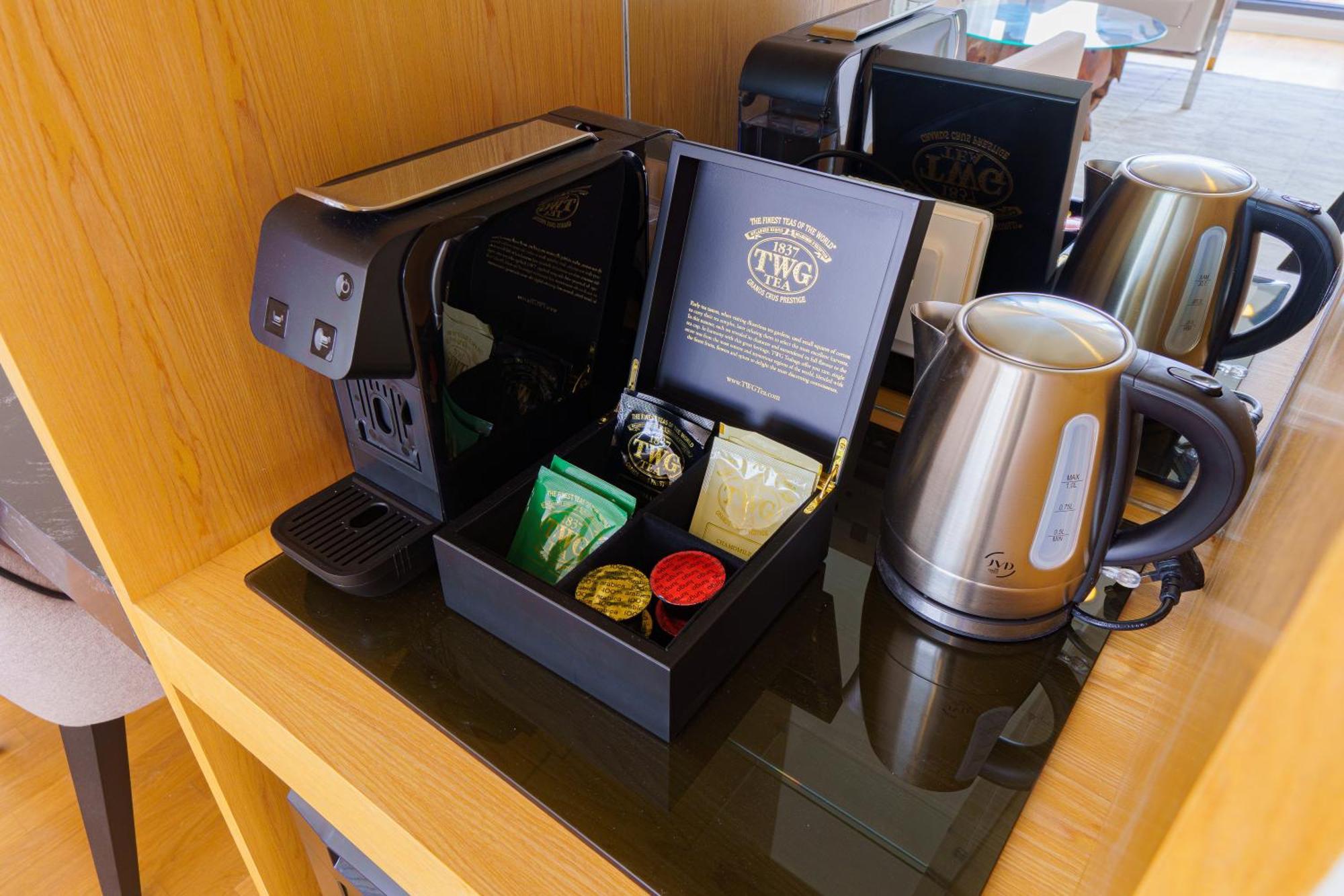 The Riyaz Lavanya Langkawi Пантай-Сенанг Экстерьер фото A Nespresso coffee machine in a hotel room